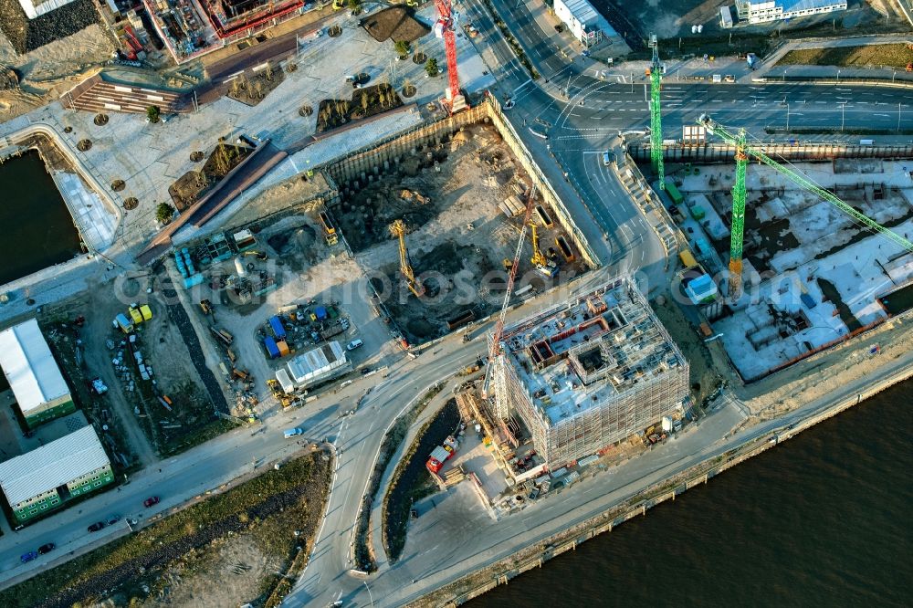 Hamburg from above - Construction site with piling works for the foundation slab of a new building on office ond commercial building in the district HafenCity in Hamburg, Germany