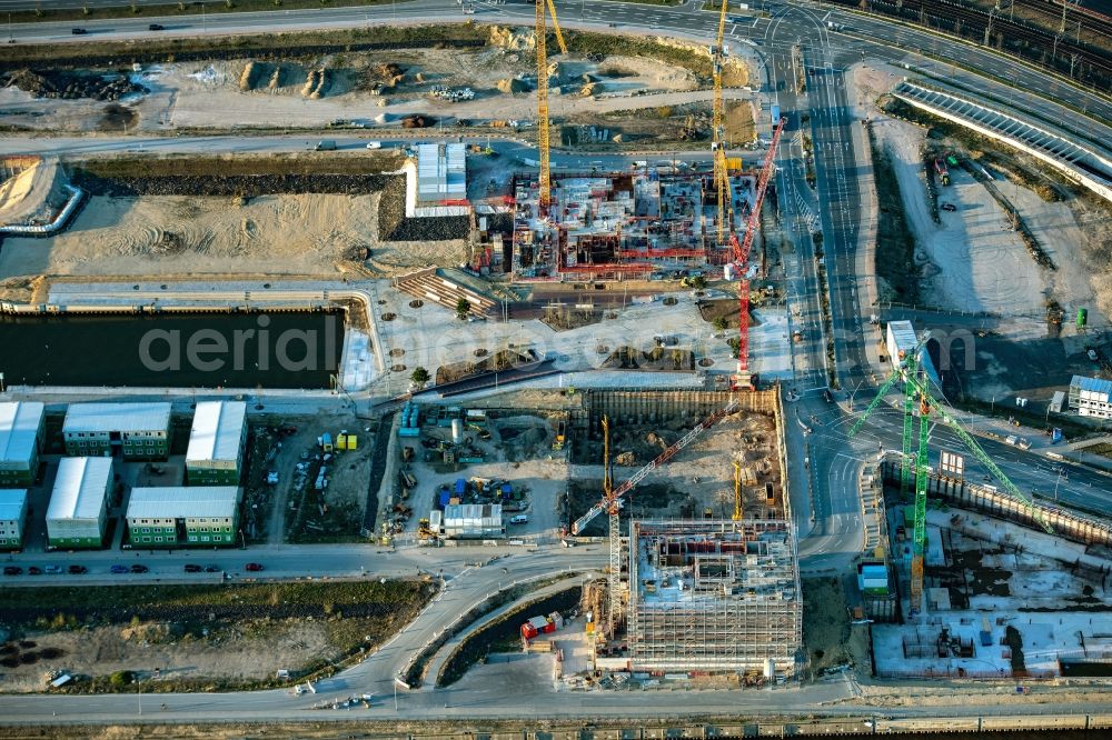 Hamburg from above - Construction site with piling works for the foundation slab of a new building on office ond commercial building in the district HafenCity in Hamburg, Germany