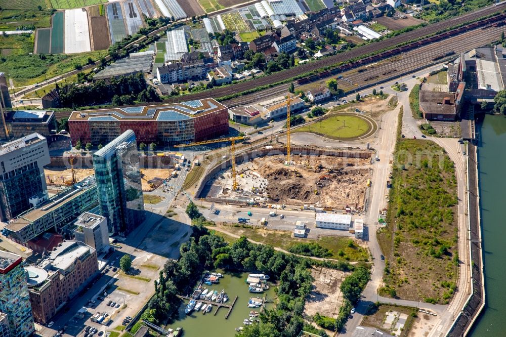 Aerial image Düsseldorf - Construction site with piling works for the foundation slab of a new building of the business- and officehouse FLOAT between Franzsiusstreet and Holzstreet in Duesseldorf in the state North Rhine-Westphalia. Building owner is Casa Stupenda Franziusstrasse GmbH & Co. KG, architecture is realised by RPBW Renzo Piano Building Workshop. The project is managed by WITTE Projektmanagement GmbH