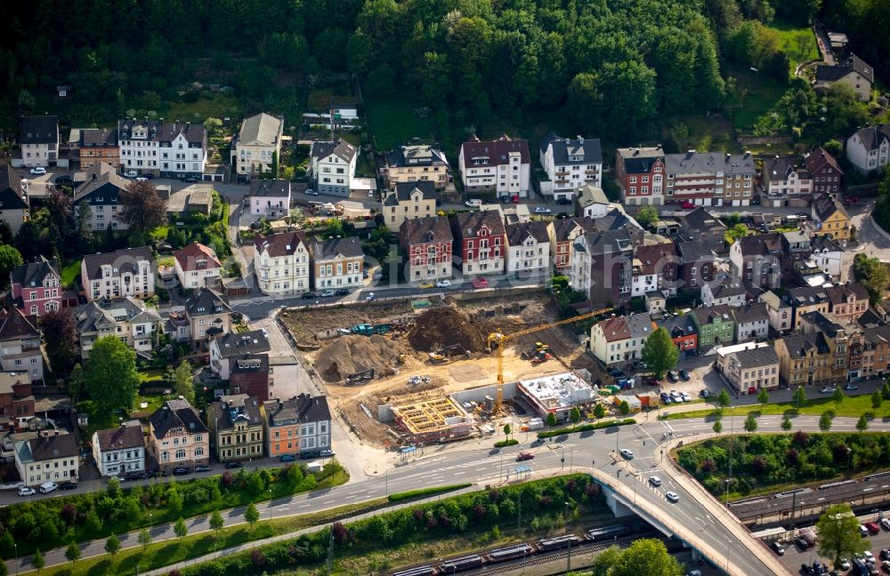 Hagen from the bird's eye view: Construction site with piling works for the foundation slab of a new building at Lower Isenberg street in Hohenlimburg in Hagen in the state North Rhine-Westphalia