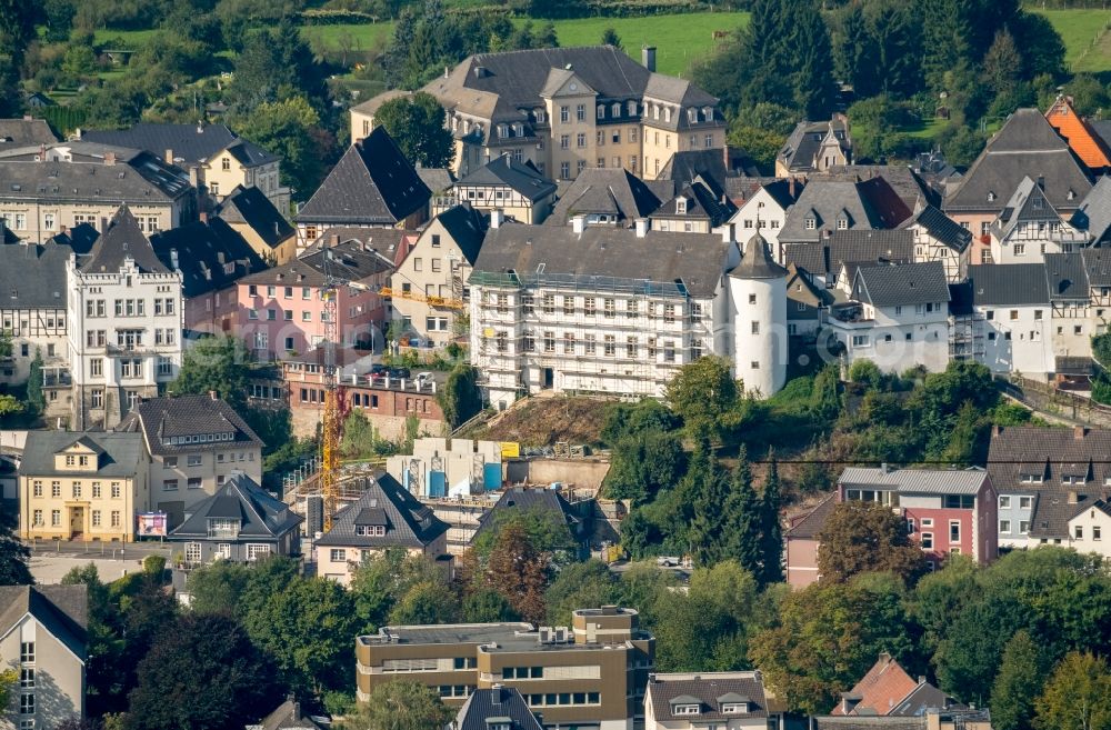 Arnsberg from the bird's eye view: Construction site with piling works for the foundation slab of a new building and Umbaus of Sauerland-Museum in Arnsberg in the state North Rhine-Westphalia, Germany