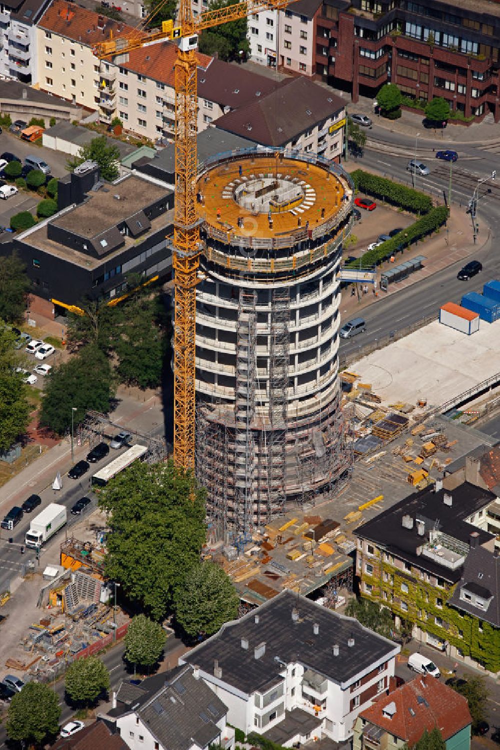 Bochum from the bird's eye view: Baustelle Exenterhouse / Exenterhaus auf einem ehemaligen denkmalgeschützen Hoch- Bunker an der Universitätsstraße in Bochum. Der Berliner Architekt Gerhard Spangenberg errichtet hier auf 15 Stockwerken ein Büro- und Geschäftshaus. Construction Site at a former bunker at the University Street in Bochum.