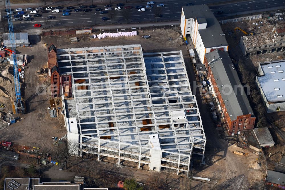 Aerial image Berlin - Demolition site of the ruins of the factory building of the former BaerenSiegel distillery on Adlergestell in Adlershof, Berlin. At the construction site of the distinctive production building GDR times development a shopping center