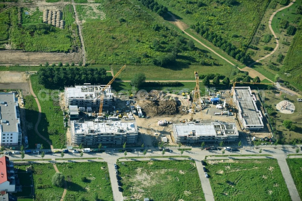 Aerial photograph Schönefeld - Construction site for the new building of Asylum accommodation buildings on Leonorenstrasse in the district Lankwitz in Berlin, Germany. Involved companies are Bundesamt fuer Migration und Fluechtlinge, Landesamt fuer Fluechtlingsangelegenheiten (LAF)