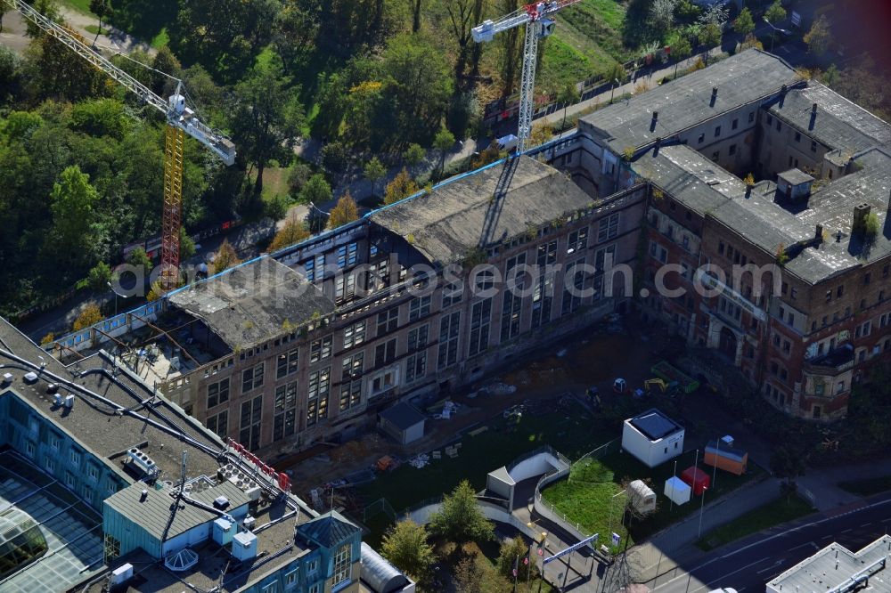 Aerial image Leipzig - Construction site building complex of the ruins of the Bugra exhibition hall in Leipzig in Saxony. The Hildebrand & Juergens GmbH plans to historically appropriate renovation and remodeling of the historic building