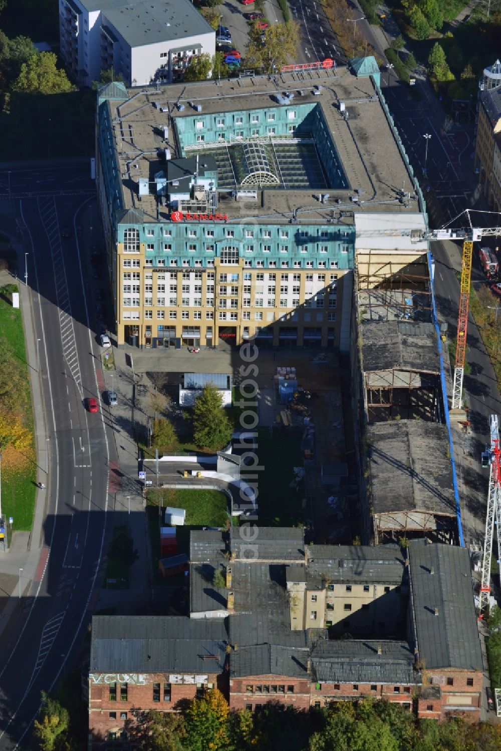 Aerial photograph Leipzig - Construction site building complex of the ruins of the Bugra exhibition hall in Leipzig in Saxony. The Hildebrand & Juergens GmbH plans to historically appropriate renovation and remodeling of the historic building