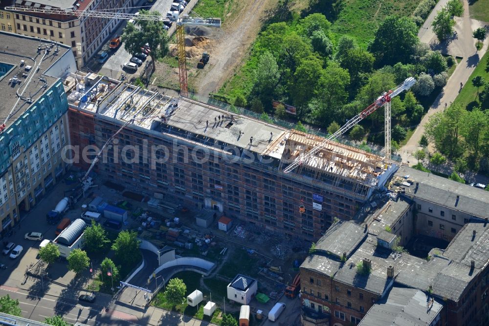 Aerial photograph Leipzig - Construction site building complex of the ruins of the Bugra exhibition hall in Leipzig in Saxony. The Hildebrand & Juergens GmbH plans to historically appropriate renovation and remodeling of the historic building