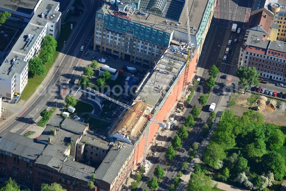 Leipzig from the bird's eye view: Construction site building complex of the ruins of the Bugra exhibition hall in Leipzig in Saxony. The Hildebrand & Juergens GmbH plans to historically appropriate renovation and remodeling of the historic building