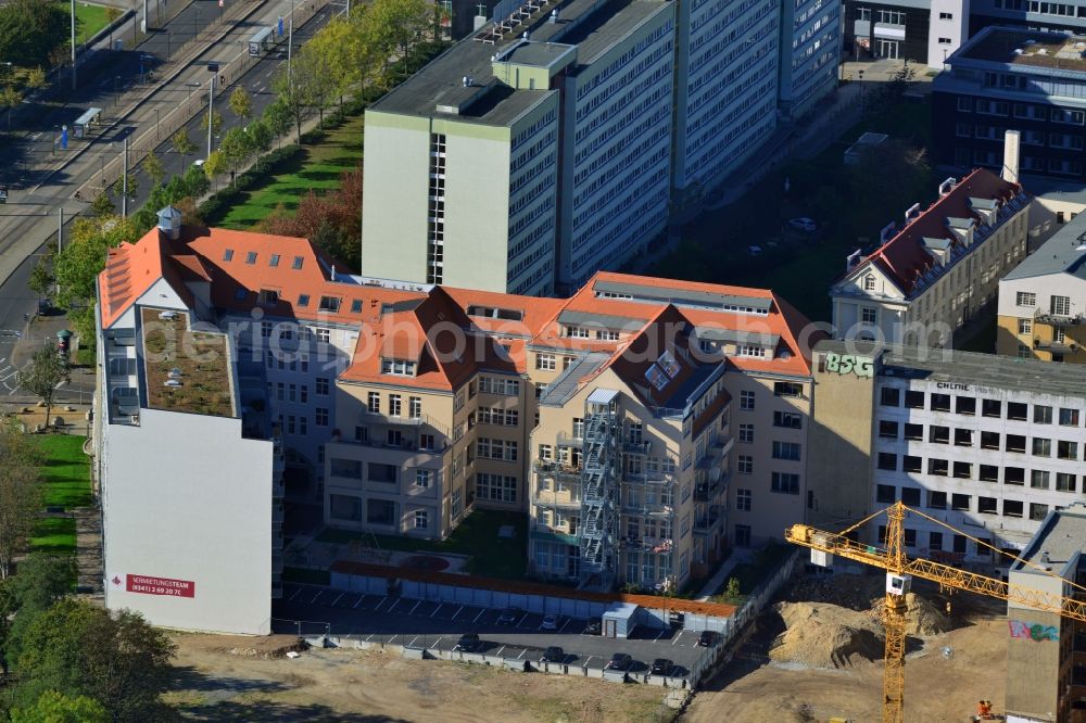 Leipzig from above - Gutted buildings on the area of a former printing plant in Leipzig in the state Saxony. The old buildings are part of a housing project