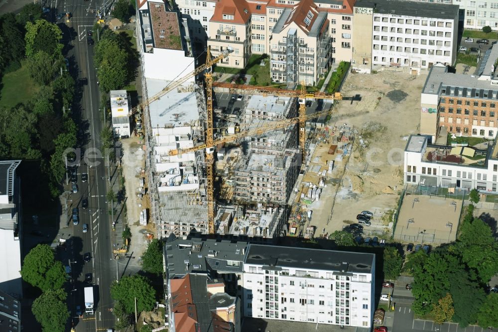 Aerial image Leipzig - Gutted buildings on the area of a former printing plant in Leipzig in the state Saxony. The old buildings are part of a housing project