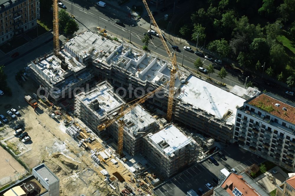 Leipzig from the bird's eye view: Gutted buildings on the area of a former printing plant in Leipzig in the state Saxony. The old buildings are part of a housing project