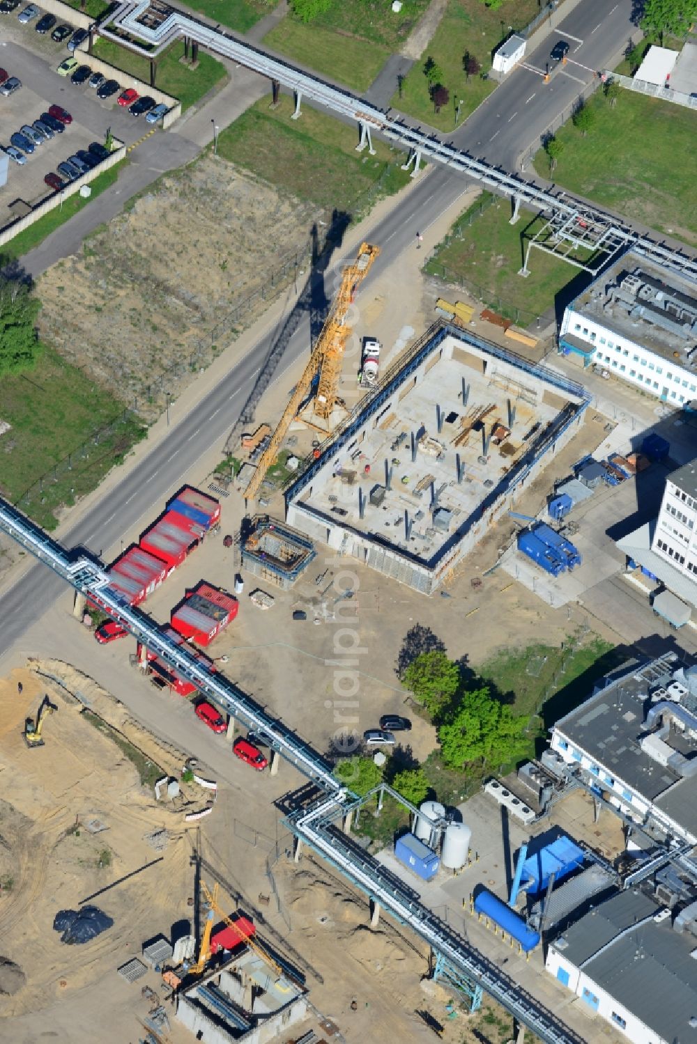 Aerial image Berlin - Construction site on the compound of the block heat and power plant BHKW Adlershof in the Treptow-Koepenick district of Berlin. The underground heavy construction is being completed