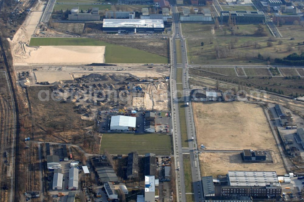 Aerial image Berlin - Blick auf den Bau von Hallen und Büroräumen am Groß-Berliner Damm in Berlin-Adlershof. Adlershof ist ein Ortsteil im Bezirk Treptow-Köpenick von Berlin. Im Gewerbepark am Groß-Berliner Damm in unmittelbarer Nähe zum Wirtschafts- und Wissenschaftsstandort Adlershof baut die TLG Immobilien Hallen und Büroräume für produzierendes Gewerbe, Maschinenbauer, Vertriebs-, Großhandel- und Logistikunternehmen. Kontakt: TLG IMMOBILIEN GmbH, Herr Alexan der Meißner, Tel. +49 (030) 24 303 391,