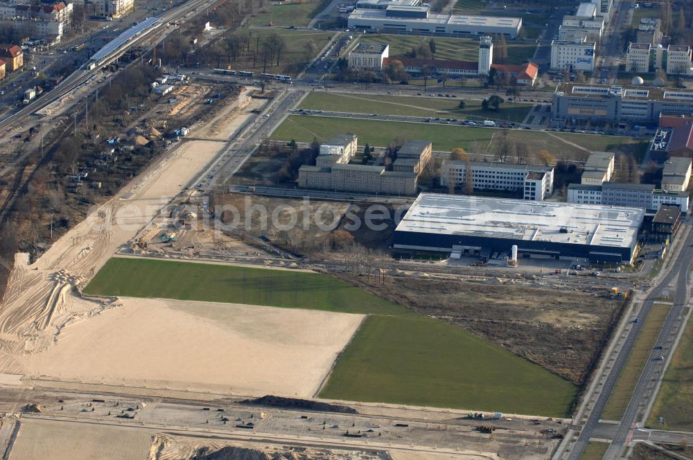 Berlin from the bird's eye view: Blick auf den Bau von Hallen und Büroräumen am Groß-Berliner Damm in Berlin-Adlershof. Adlershof ist ein Ortsteil im Bezirk Treptow-Köpenick von Berlin. Im Gewerbepark am Groß-Berliner Damm in unmittelbarer Nähe zum Wirtschafts- und Wissenschaftsstandort Adlershof baut die TLG Immobilien Hallen und Büroräume für produzierendes Gewerbe, Maschinenbauer, Vertriebs-, Großhandel- und Logistikunternehmen. Kontakt: TLG IMMOBILIEN GmbH, Herr Alexan der Meißner, Tel. +49 (030) 24 303 391,