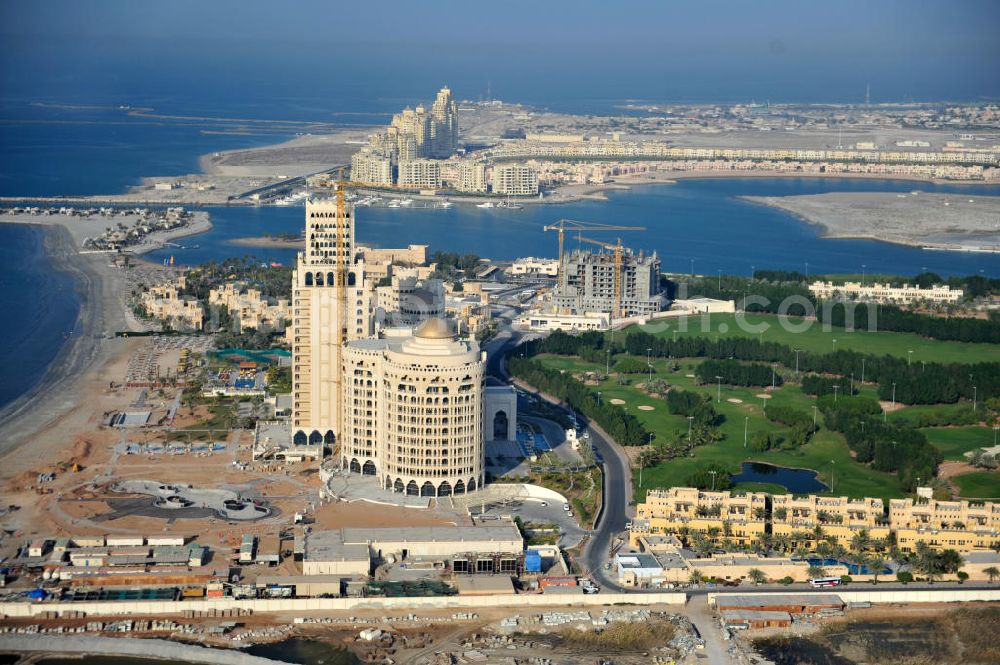 Ras Al Khaimah from above - Construction site of the Al Hamra Palace Hotel in the arab emirate Ras Al Khaimah. The hotel is part of the Al Hamra Village Project, the second largest construction project of Ras Al Khaimah. The project is realized by the state-owned company Al Hamra Real Estate