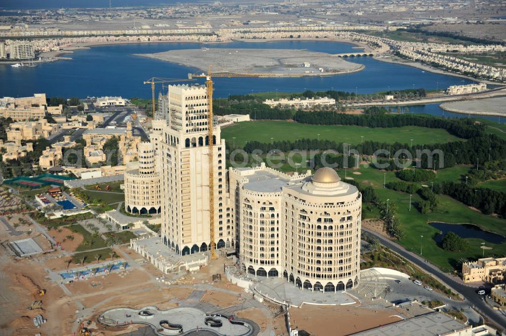 Aerial photograph Ras Al Khaimah - Construction site of the Al Hamra Palace Hotel in the arab emirate Ras Al Khaimah. The hotel is part of the Al Hamra Village Project, the second largest construction project of Ras Al Khaimah. The project is realized by the state-owned company Al Hamra Real Estate