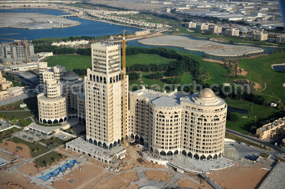 Ras Al Khaimah from the bird's eye view: Construction site of the Al Hamra Palace Hotel in the arab emirate Ras Al Khaimah. The hotel is part of the Al Hamra Village Project, the second largest construction project of Ras Al Khaimah. The project is realized by the state-owned company Al Hamra Real Estate