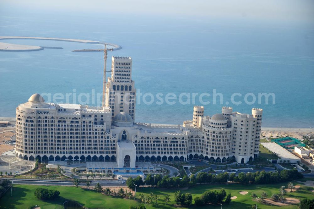 Aerial image Ras Al Khaimah - Construction site of the Al Hamra Palace Hotel in the arab emirate Ras Al Khaimah. The hotel is part of the Al Hamra Village Project, the second largest construction project of Ras Al Khaimah. The project is realized by the state-owned company Al Hamra Real Estate