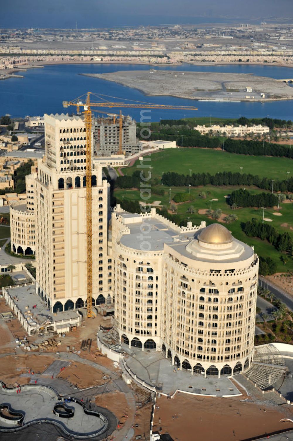 Aerial photograph Ras Al Khaimah - Construction site of the Al Hamra Palace Hotel in the arab emirate Ras Al Khaimah. The hotel is part of the Al Hamra Village Project, the second largest construction project of Ras Al Khaimah. The project is realized by the state-owned company Al Hamra Real Estate