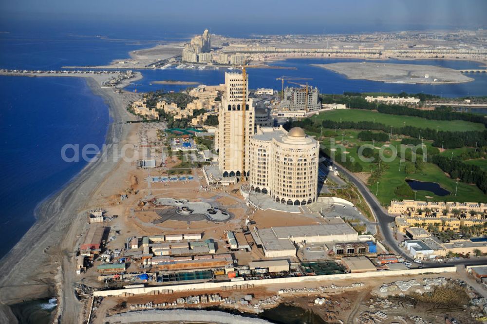 Ras Al Khaimah from the bird's eye view: Construction site of the Al Hamra Palace Hotel in the arab emirate Ras Al Khaimah. The hotel is part of the Al Hamra Village Project, the second largest construction project of Ras Al Khaimah. The project is realized by the state-owned company Al Hamra Real Estate