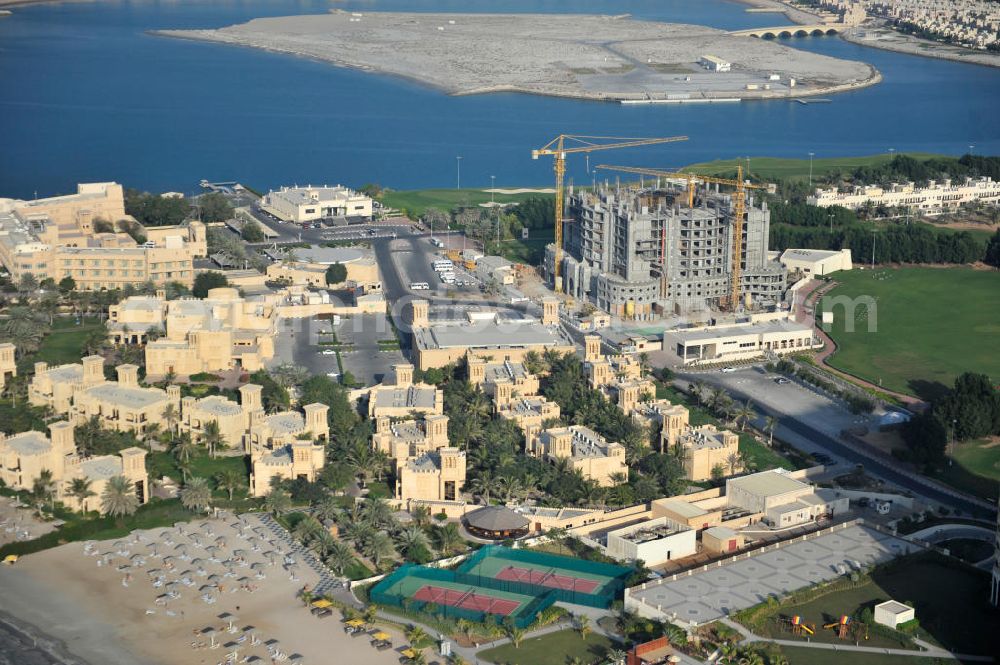 Ras Al Khaimah from above - Construction site of the Al Hamra Village Project in the arab emirate Ras Al Khaimah. The project is realized by the state-owned company Al Hamra Real Estate