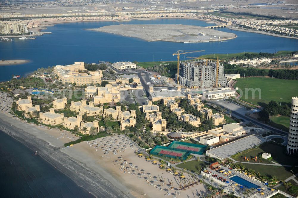 Ras Al Khaimah from the bird's eye view: Construction site of the Al Hamra Village Project in the arab emirate Ras Al Khaimah. The project is realized by the state-owned company Al Hamra Real Estate