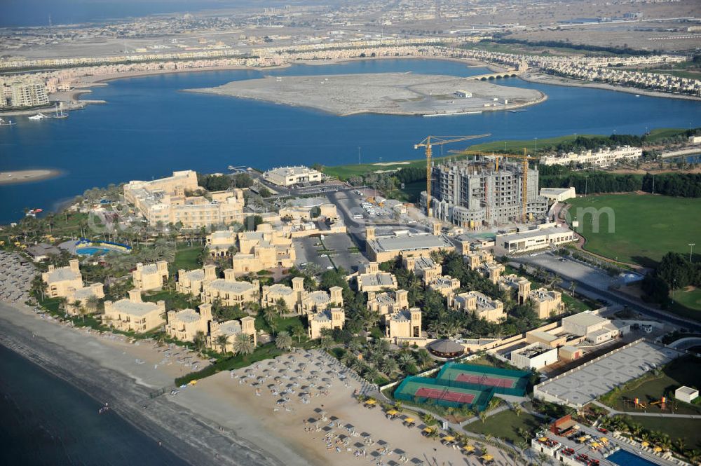 Aerial image Ras Al Khaimah - Construction site of the Al Hamra Village Project in the arab emirate Ras Al Khaimah. The project is realized by the state-owned company Al Hamra Real Estate