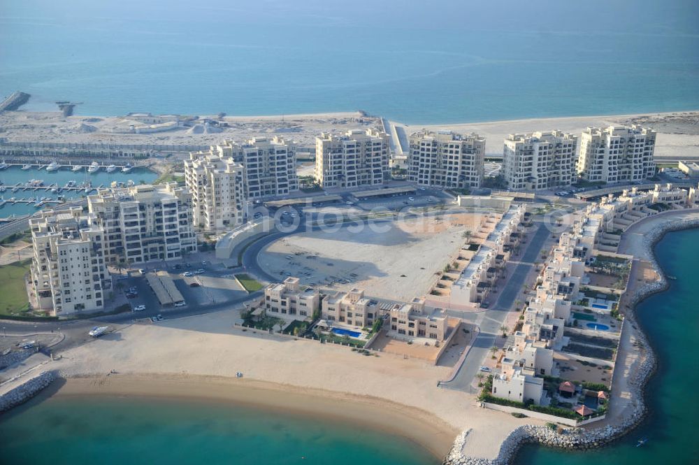 Ras Al Khaimah from the bird's eye view: Construction site of the Al Hamra Village Project in the arab emirate Ras Al Khaimah. The project is realized by the state-owned company Al Hamra Real Estate