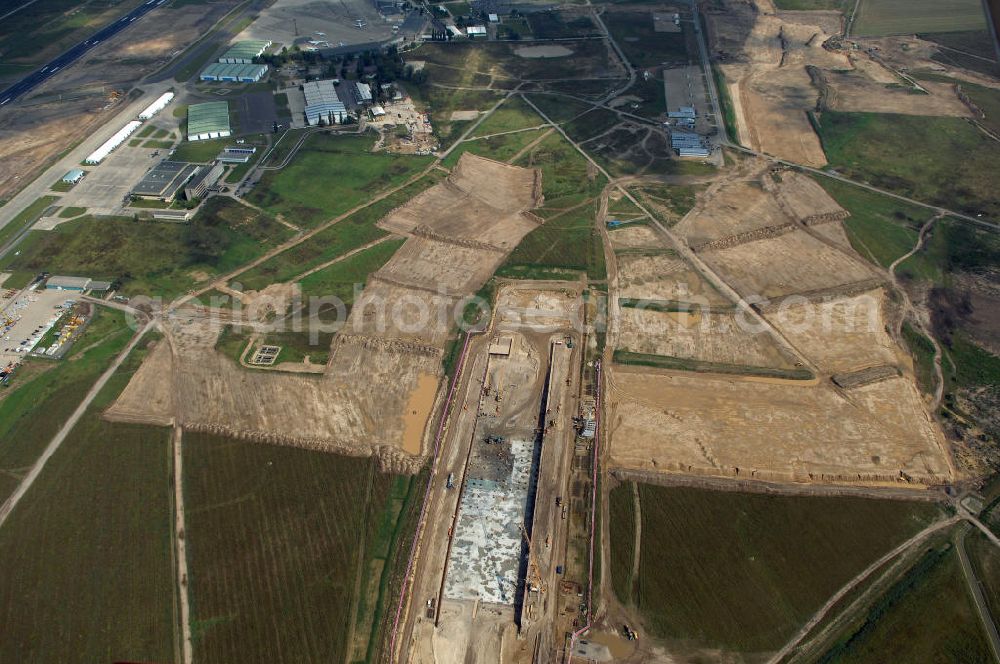 Schönefeld from the bird's eye view: Blick auf den Bau des Hauptstadtflughafens Berlin Brandenburg International (BBI) in Schönefeld. Es ist das größte Infrastrukturobjekt der neuen Länder und wird einer der modernsten Flughafen Europas. Homepage: http://