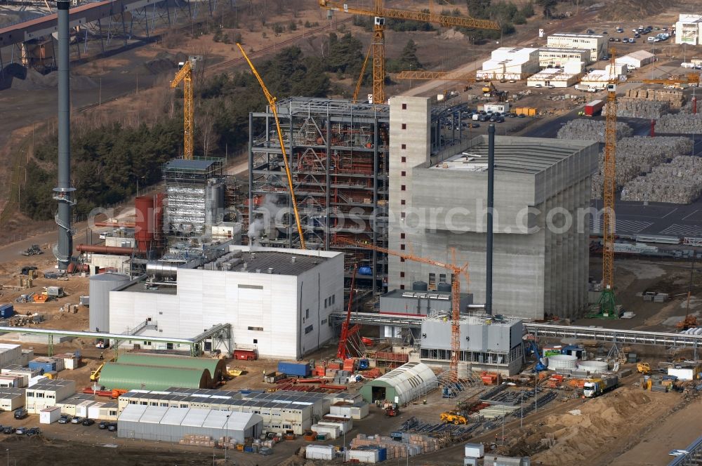 Eisenhüttenstadt from the bird's eye view: Construction site at the heating plant on the factory site for corrugated base paper Propapier PM2 GmbH plant in Eisenhuettenstadt in Brandenburg. The heating plant supplies only the paper factory with electricity, steam and heat