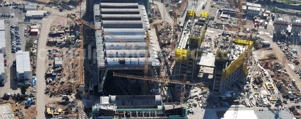 Frankfurt am Main from the bird's eye view: High-rise construction of the twin towers of the ECB's headquarters in Frankfurt / Main in Hesse. The new headquarters of the European Central Bank is a design by the architects of Coop Himmelb (l) au