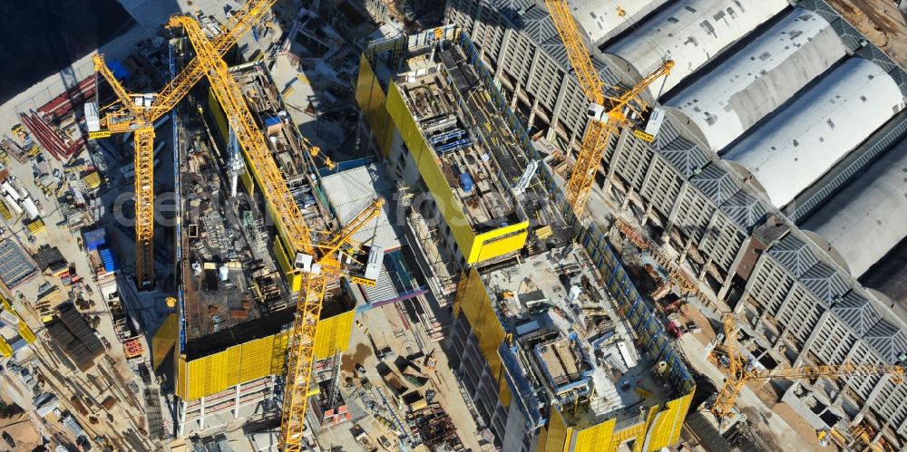 Frankfurt am Main from the bird's eye view: High-rise construction of the twin towers of the ECB's headquarters in Frankfurt / Main in Hesse. The new headquarters of the European Central Bank is a design by the architects of Coop Himmelb (l) au