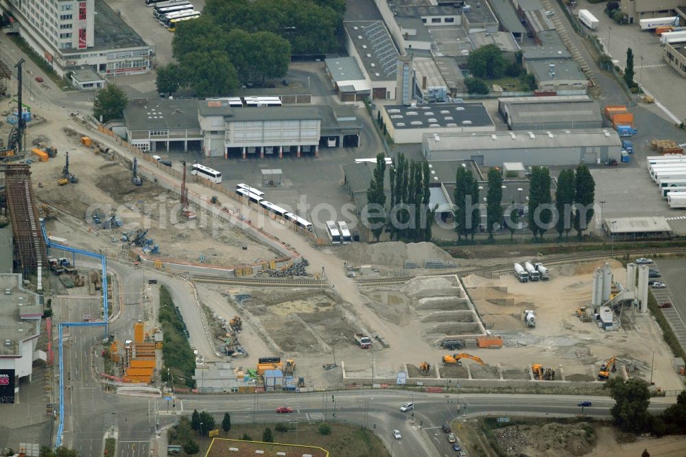 Berlin from above - Construction works in the industrial area on Grenzallee in the district of Neukoelln in Berlin in Germany. A new part of the federal motorway A100 - the city motorway - is being created amidst existing company and industrial compounds