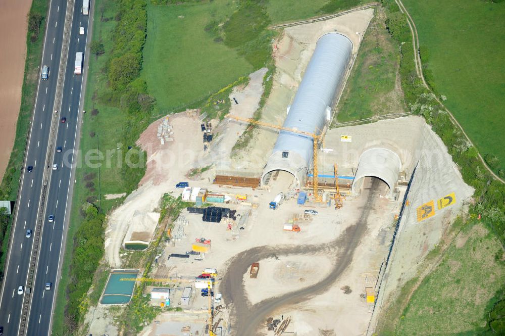 Jena from the bird's eye view: Blick auf die Baustelle der Autobahnverlegung Europastrasse E40 A4 bei Jena im Bereich des Jagdbergtunnels. Bauherr: DEGES (Deutsche Einheit Fernstraßenplanungs- und bau GmbH, Berlin), Bauausführung: ARGE: Baresel, Beton und Monierbau, Kirchhoff Leipzig Ausführungsplanung: Bauzeit: 2008 - 2012 View of the construction site chase mountain highway tunnel laying E40 European highway A4 at Jena.