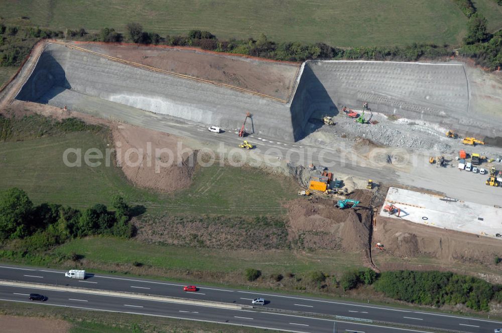 Aerial photograph JENA - Blick auf die Baustelle der Autobahnverlegung Europastrasse E40 A4 bei Jena im Bereich des Jagdbergtunnels. Bauherr: DEGES (Deutsche Einheit Fernstraßenplanungs- und bau GmbH, Berlin),Bauausführung: ARGE: Baresel, Beton und Monierbau, Kirchhoff Leipzig - Ausführungsplanung: Bauzeit: 2008 - 2012