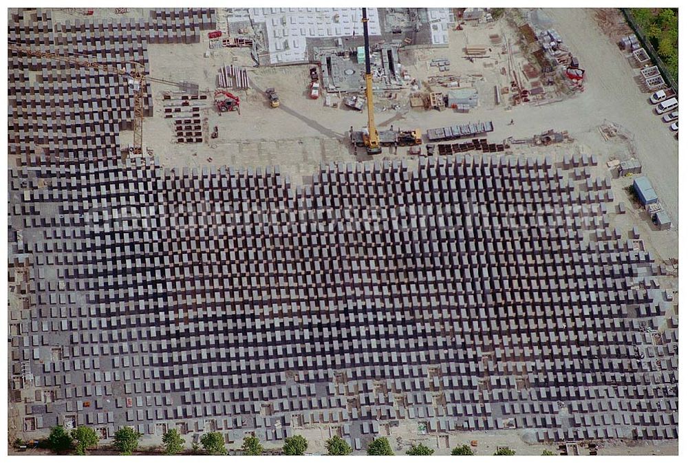 Aerial photograph Berlin - View of the Holocaust memorial in Berlin Mitte. It is a monument for those under the rule of the german in the Holocaust murdered Jews