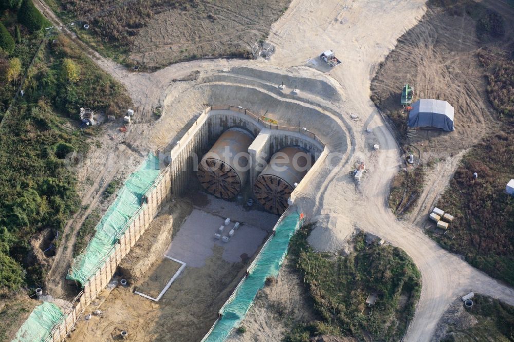 Bad Bellingen from above - Construction site at the north portal of the Katzenberg tunnel in Bad Bellingen in the state of Baden-Wuerttemberg. The two drilling heads from Herrenknecht for the four-lane expansion of the Upper Rhine railway track have reached their final destination