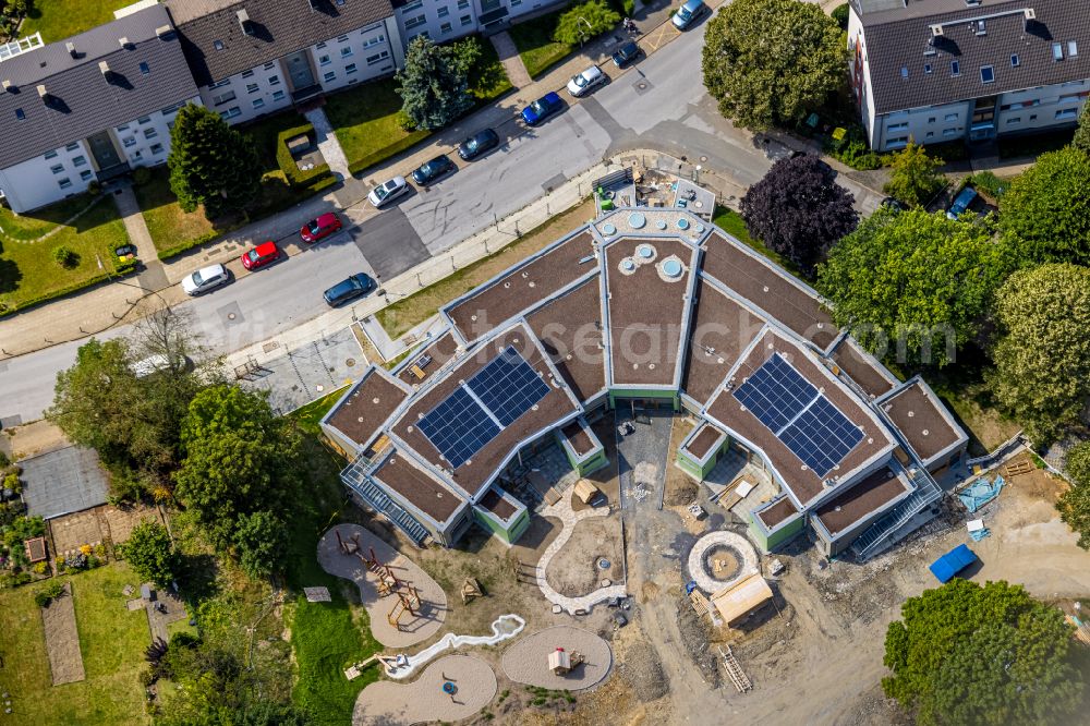 Velbert from the bird's eye view: New construction site for the construction of a kindergarten building and Nursery school on street Fontanestrasse in Velbert in the state North Rhine-Westphalia, Germany