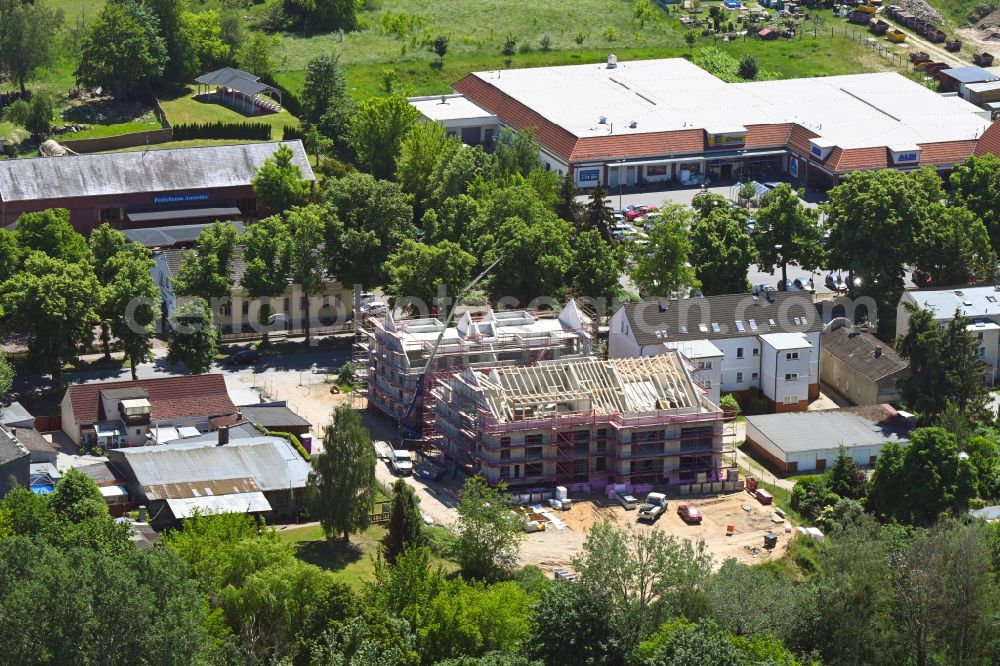 Aerial photograph Werneuchen - New construction site for the construction of a kindergarten building and Nursery school on Freienwalder Strasse in Werneuchen in the state Brandenburg, Germany