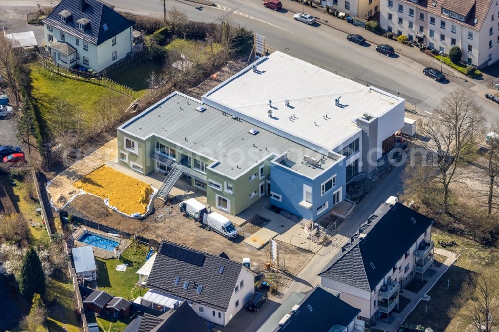 Arnsberg from the bird's eye view: New construction site for the construction of a kindergarten building and Nursery school Martin-Luther Kindergarten am Wintroper Weg in Arnsberg at Sauerland in the state North Rhine-Westphalia, Germany