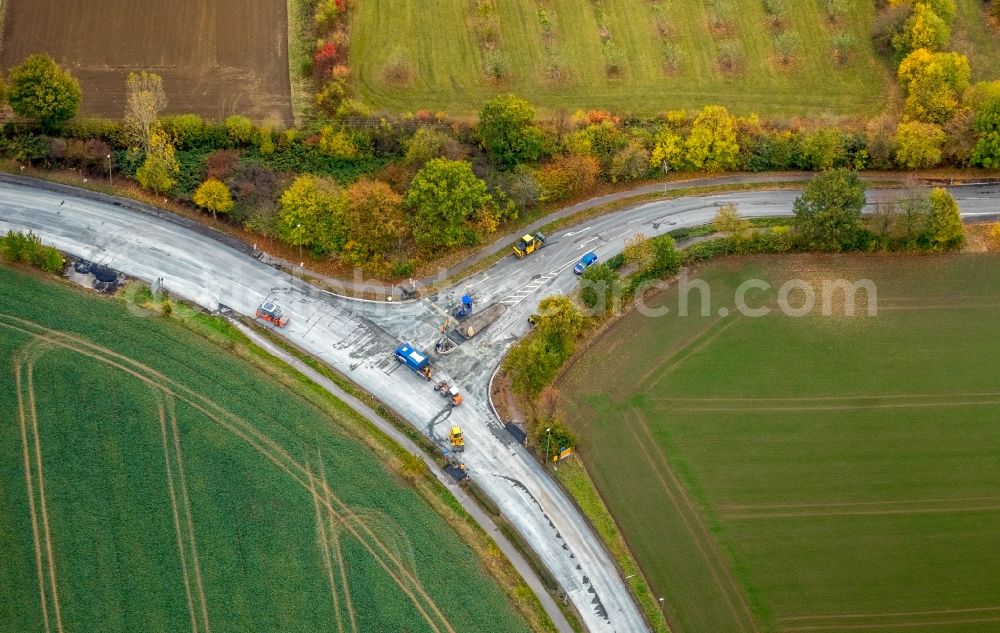 Bönen from the bird's eye view: Construction site road over the crossroads Rhynerner Strasse in Boenen in the state North Rhine-Westphalia, Germany