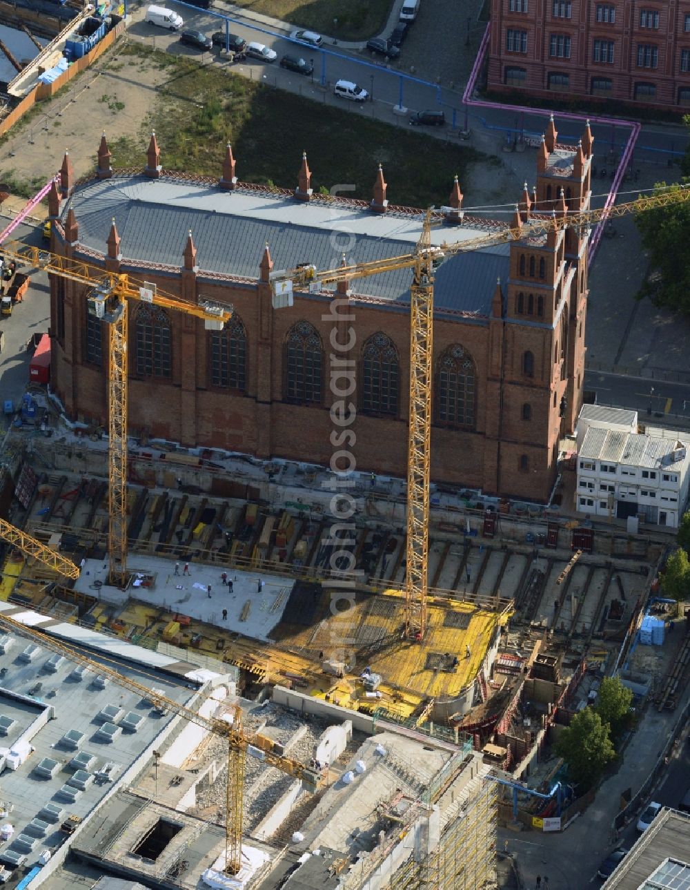 Berlin from the bird's eye view: View of construction site of the Kronprinzengärten in Berlin-Mitte. On the area between the Federal Foreign Office, the Kronprinzenpalais, the Friedrichswerder Church and the Oberwallstreet created an exclusive building complex of luxury apartments. This new project is implemented by the Bauwert Investment Group