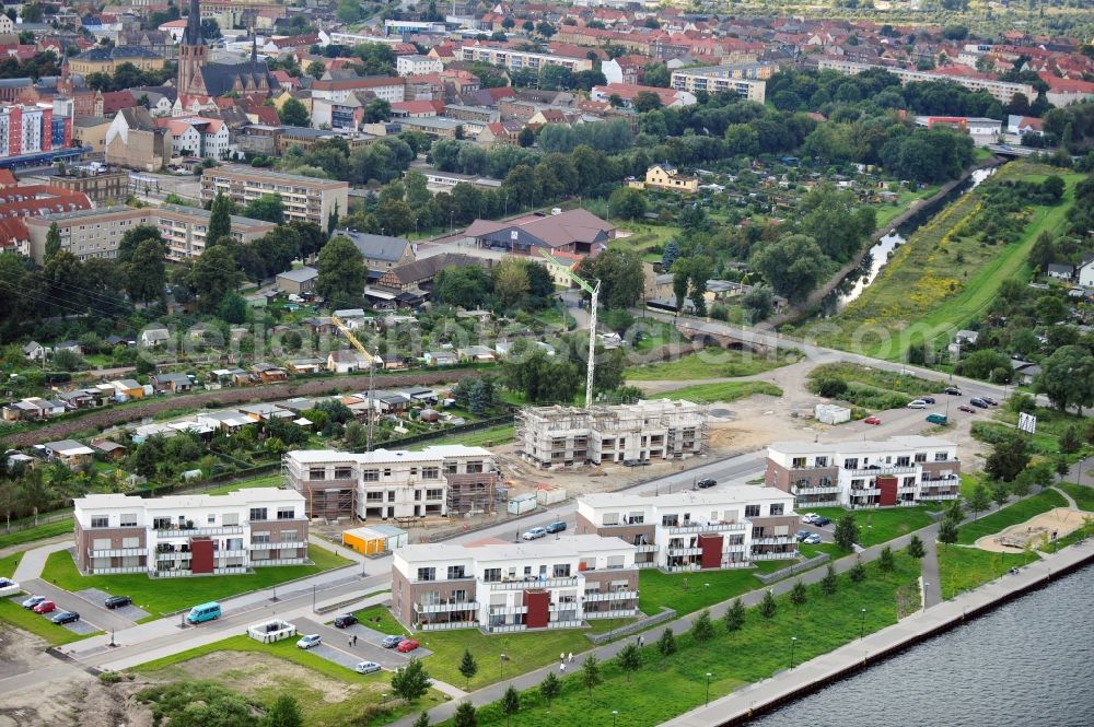 Aerial photograph Bitterfeld - Construction site of newly built flats at a lake in Bitterfeld in Saxony-Anhalt