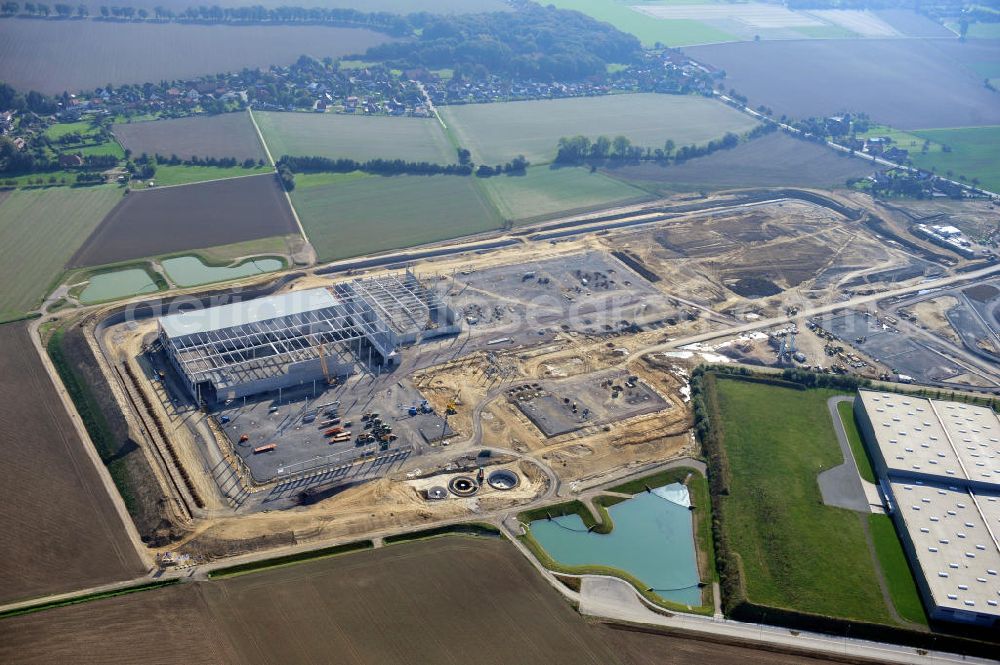 Bantorf from the bird's eye view: Neubau-Baustelle vom Logistikzentrum Kaufland im Gewerbegebiet Bantorf-Nord. Construction site of the new build Kaufland logistics centre in the business park Bandorf-Nord.