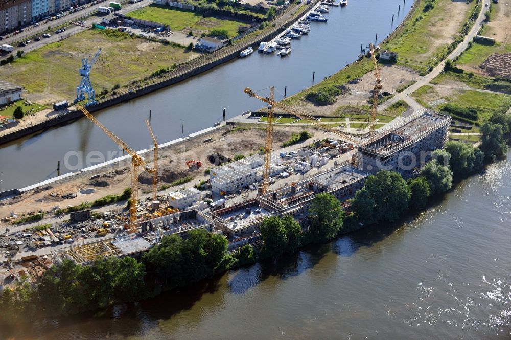 Aerial image Offenbach - View of theconstruction site on the Main Island in Offenbach in Hesse. Here the ABG FRANKFURT HOLDING housing and investment company Ltd builds a residential complex with 30 condominiums