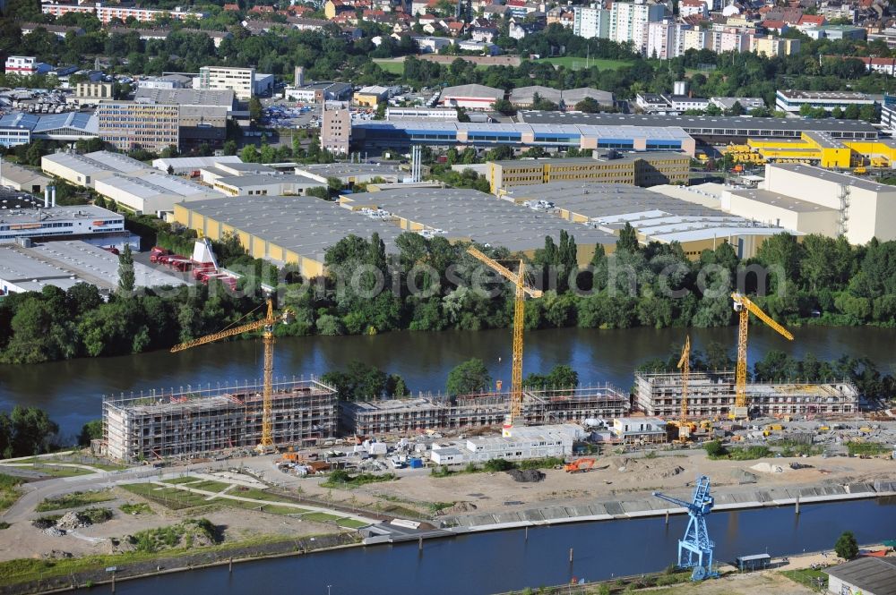 Offenbach from above - View of theconstruction site on the Main Island in Offenbach in Hesse. Here the ABG FRANKFURT HOLDING housing and investment company Ltd builds a residential complex with 30 condominiums