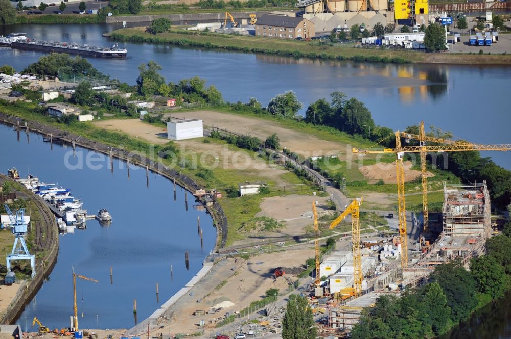 Aerial image Offenbach - View of theconstruction site on the Main Island in Offenbach in Hesse. Here the ABG FRANKFURT HOLDING housing and investment company Ltd builds a residential complex with 30 condominiums