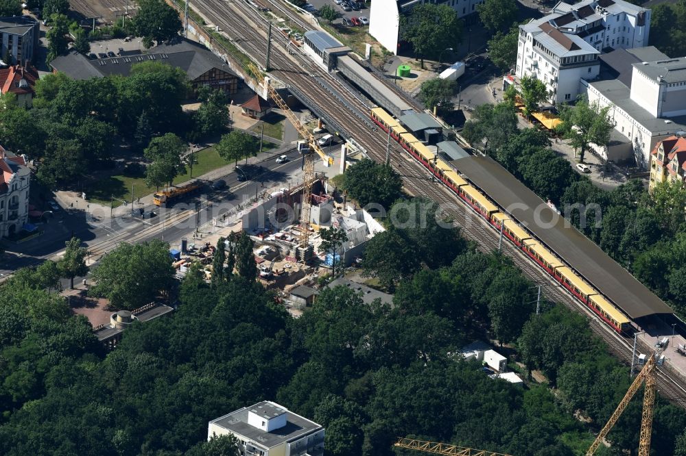 Berlin from the bird's eye view: New construction comany Mark-A. Krueger Bauunternehmung GmbH of the building complex of the shopping center Treskowallee - Am Carlsgarten on city- train station Karlshorst in Berlin