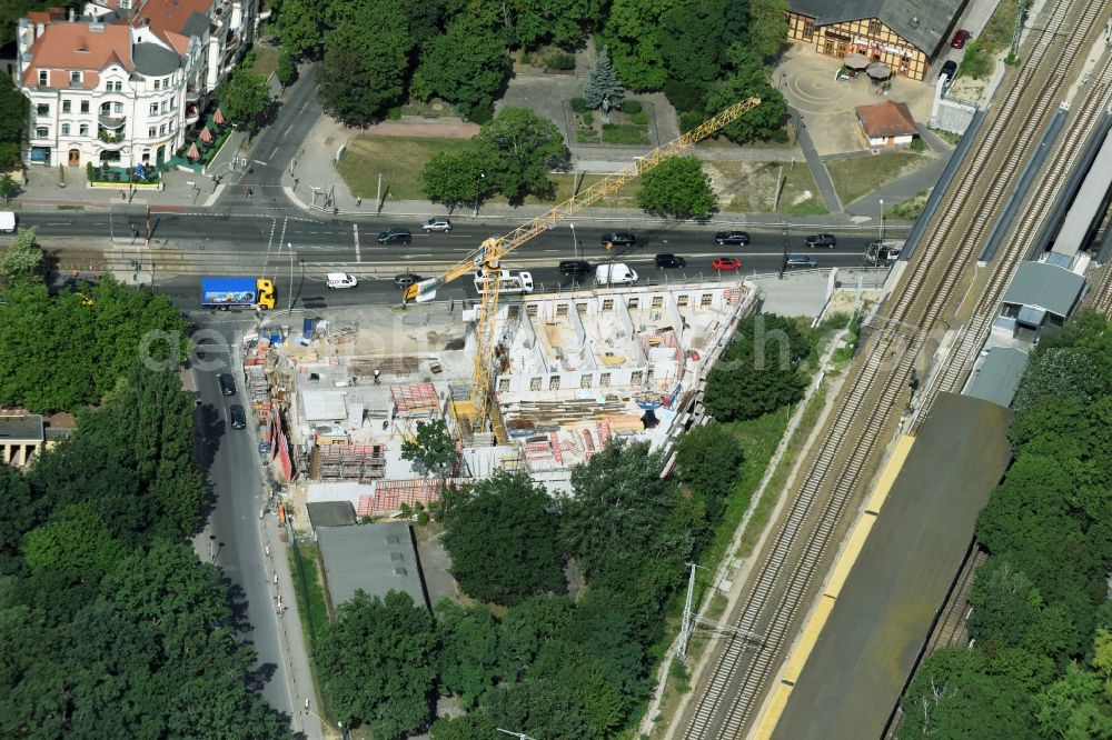 Aerial image Berlin - New construction comany Mark-A. Krueger Bauunternehmung GmbH of the building complex of the shopping center Treskowallee - Am Carlsgarten on city- train station Karlshorst in Berlin