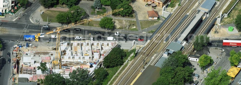 Aerial image Berlin - New construction comany Mark-A. Krueger Bauunternehmung GmbH of the building complex of the shopping center Treskowallee - Am Carlsgarten on city- train station Karlshorst in Berlin